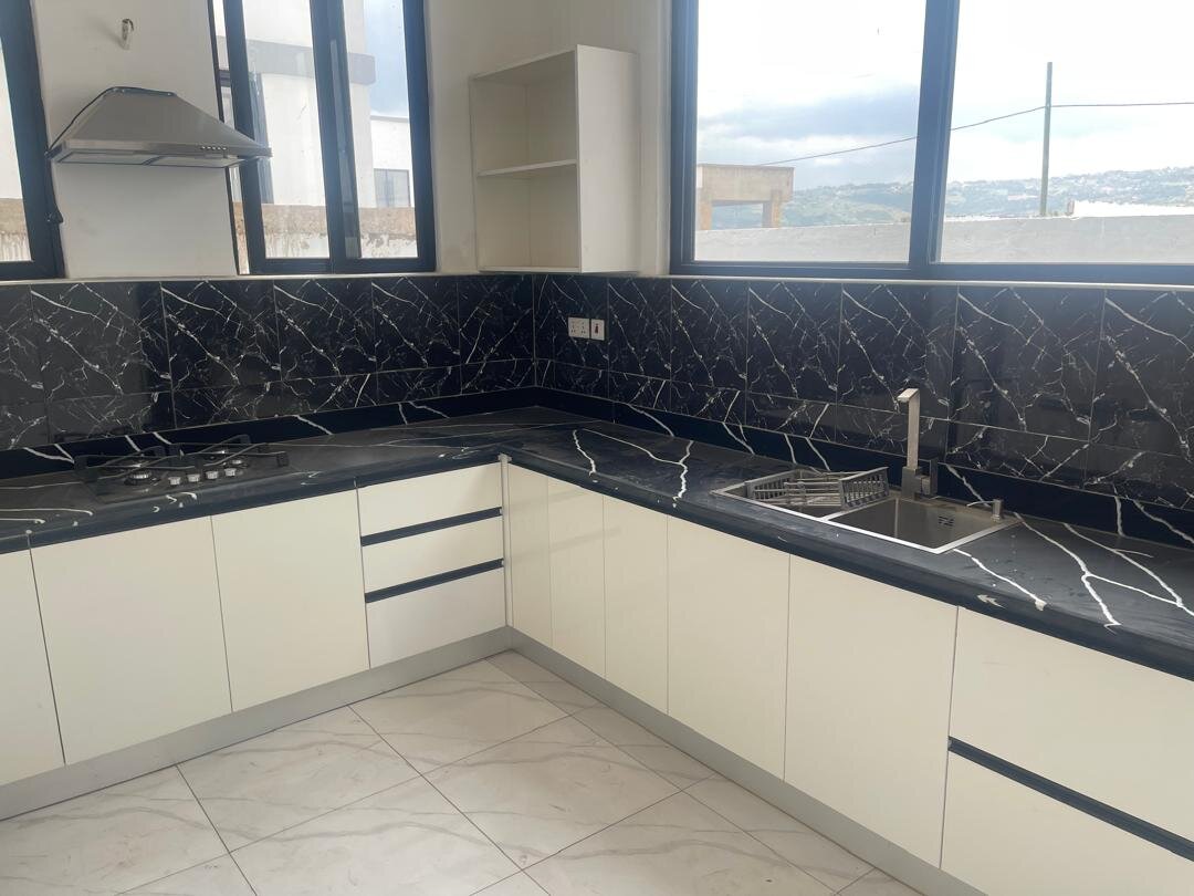 Jolly Homes Ghana - Spacious living room with high ceilings